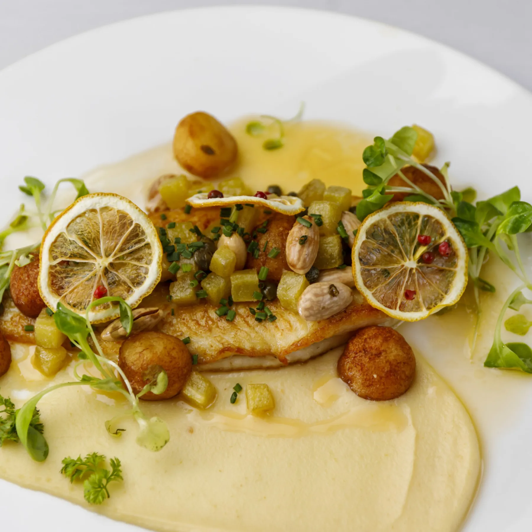 Brindille signature dishes European Dover Sole Meunière
Lacquered Aged Moulard Duck Breast
Warm Baked Almond Scented Clafoutis with Crème Chantilly